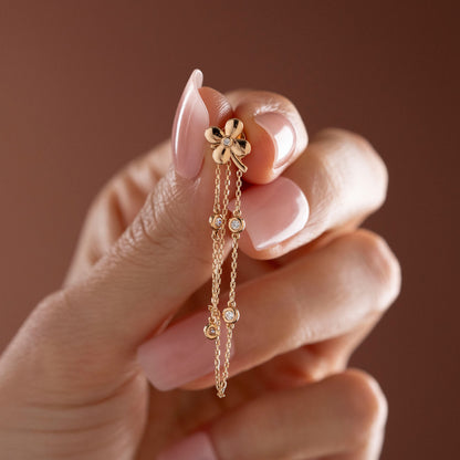 Arel Custom Jewelry 14k solid gold flower earrings with natural diamond accents and dangling chains