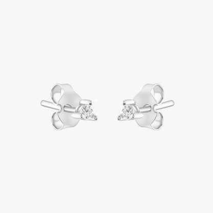 14k solid gold 3 prong diamond stud earrings featuring 2.20mm stones in rose, yellow, and white gold on a model's ear.