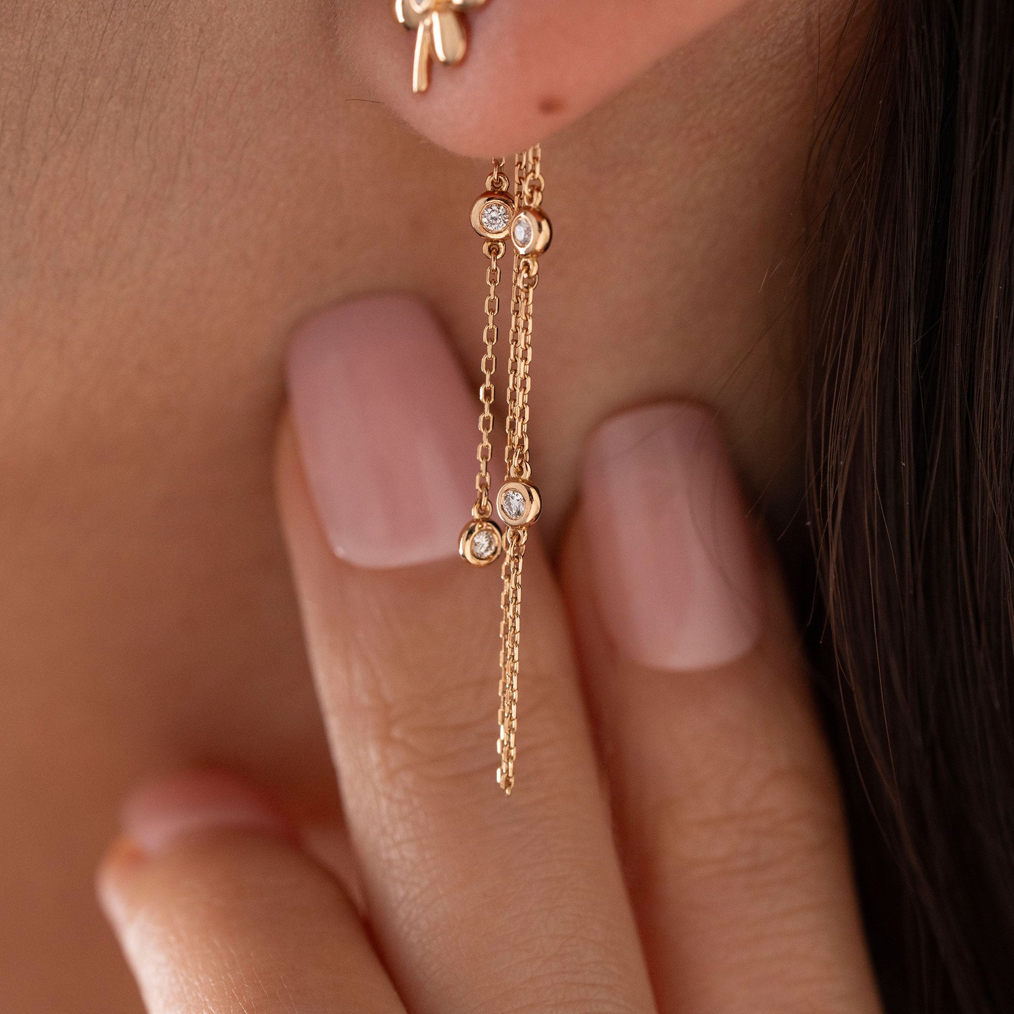 Arel Custom Jewelry 14k solid gold flower earrings with natural diamond accents and dangling chains