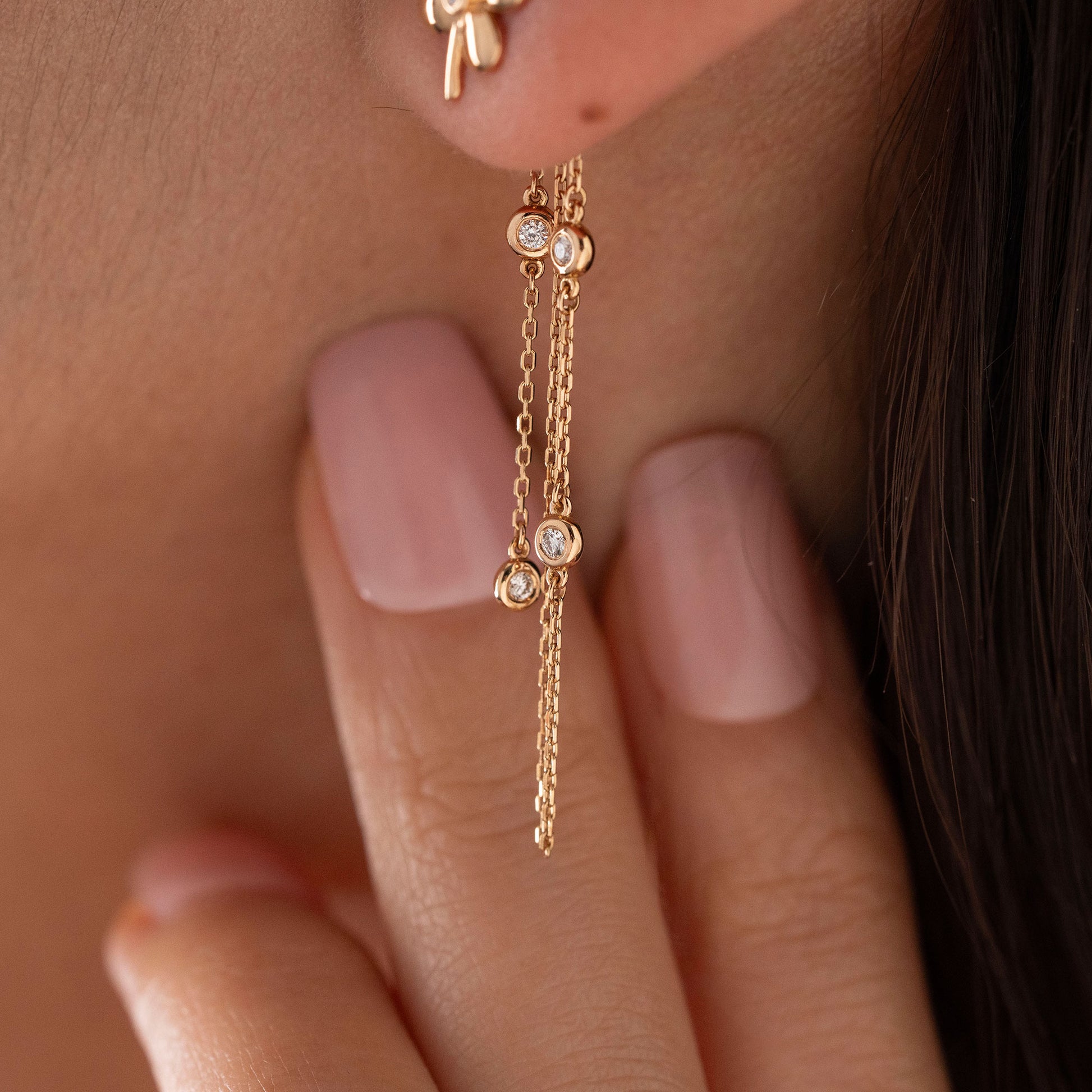 Arel Custom Jewelry 14k solid gold flower earrings with natural diamond accents and dangling chains