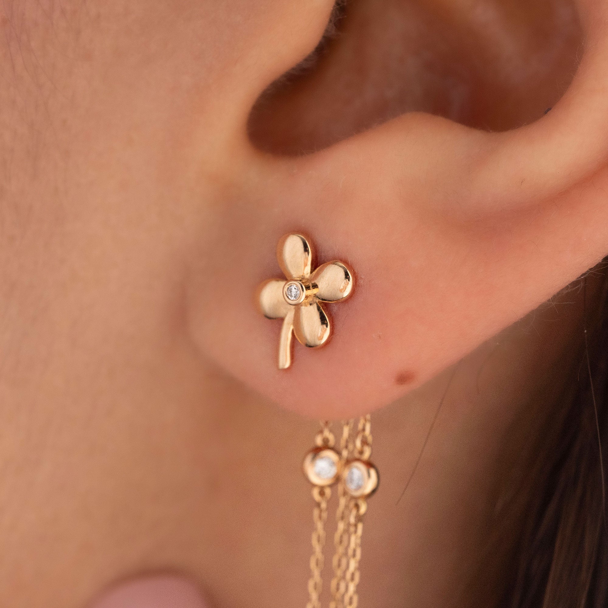 Arel Custom Jewelry 14k solid gold flower earrings with natural diamond accents and dangling chains