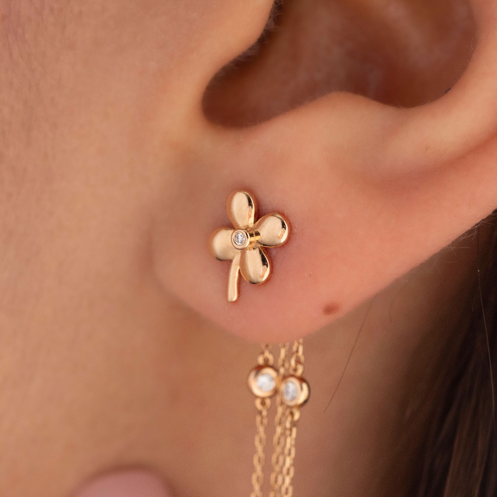 Arel Custom Jewelry 14k solid gold flower earrings with natural diamond accents and dangling chains