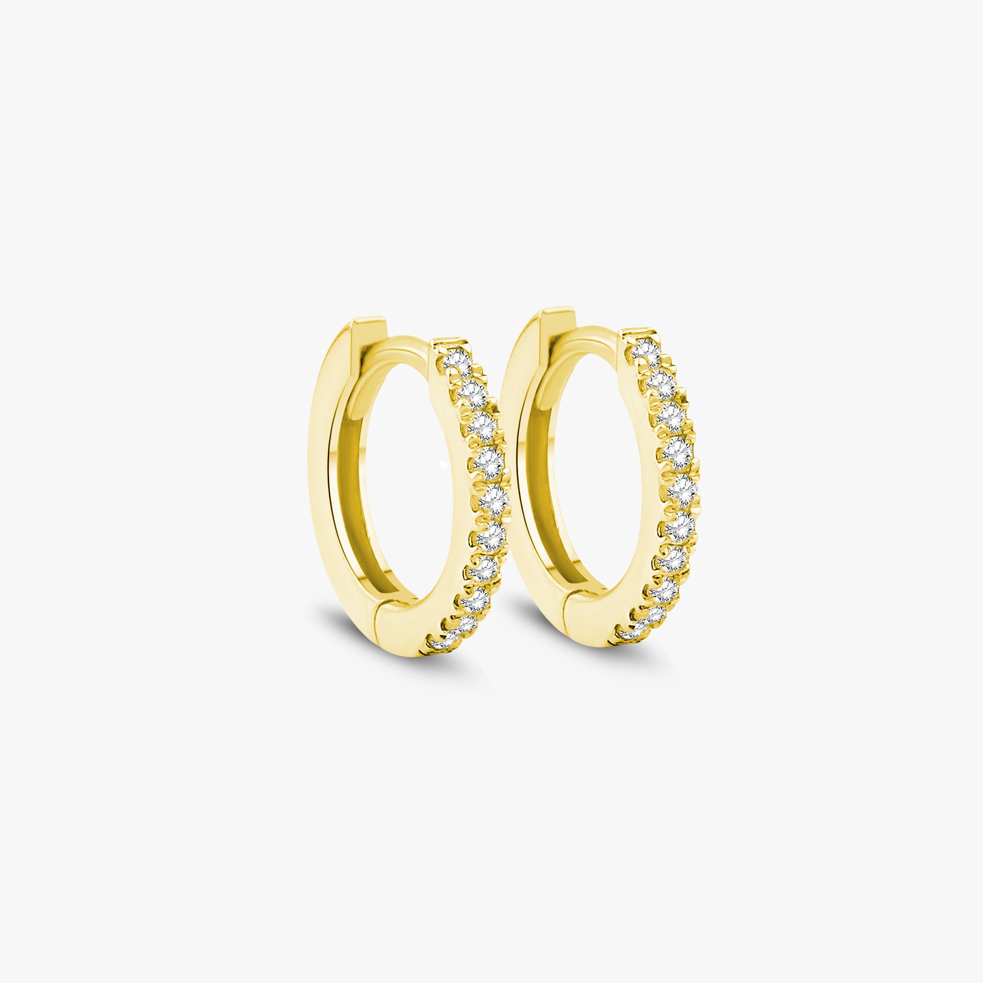Arel Custom Jewelry 14k solid white gold huggie hoop earrings featuring pave set diamonds, measuring 8mm inner diameter and 11mm outer diameter.